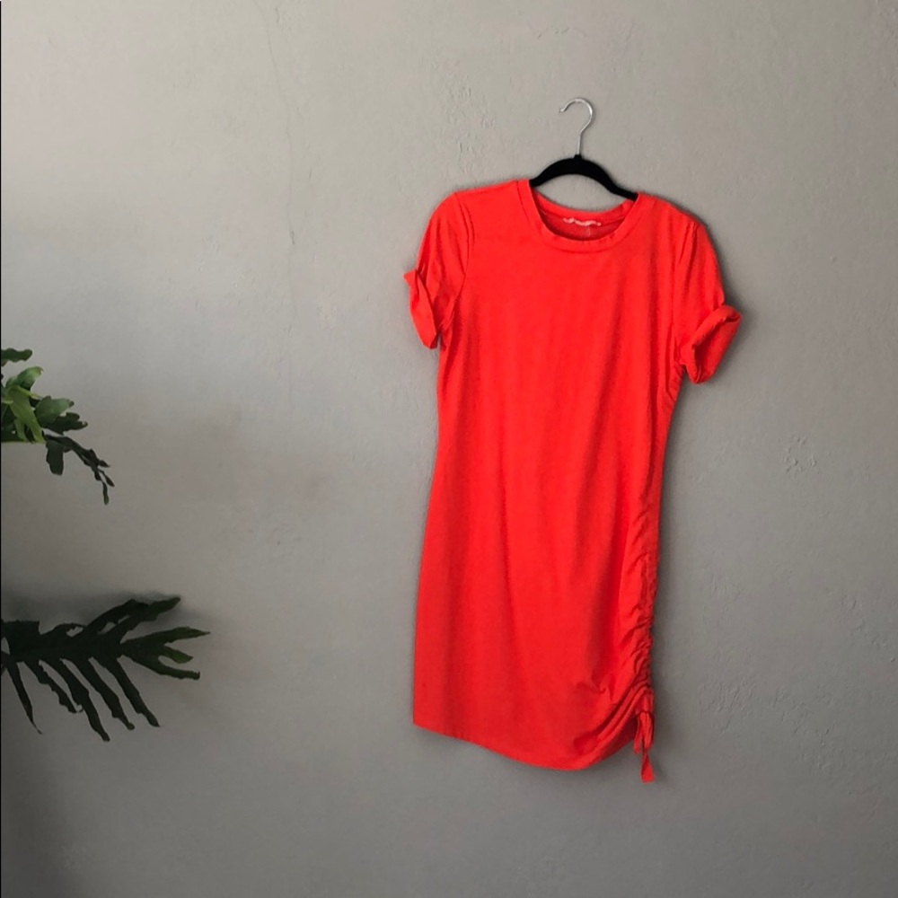 After Market orange cinch side dress!